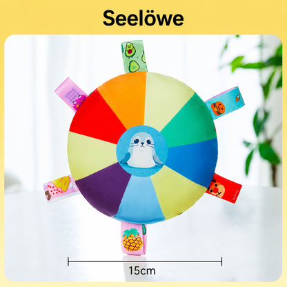 Interactive plush squeaky frisbee toy for training.